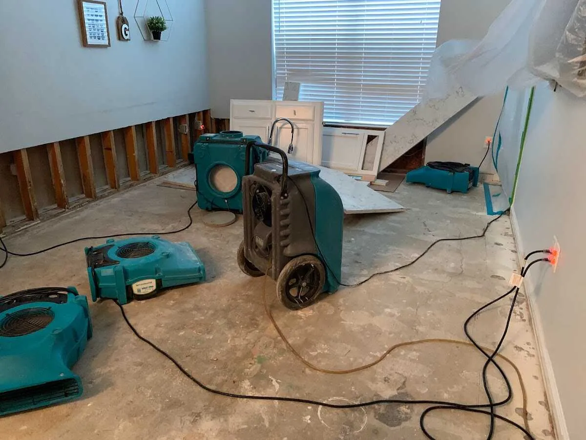 Dehumidifier in flood-cut room for Water Damage Restoration in Brentwood